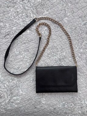 Black leather clutch with removable shoulder strap